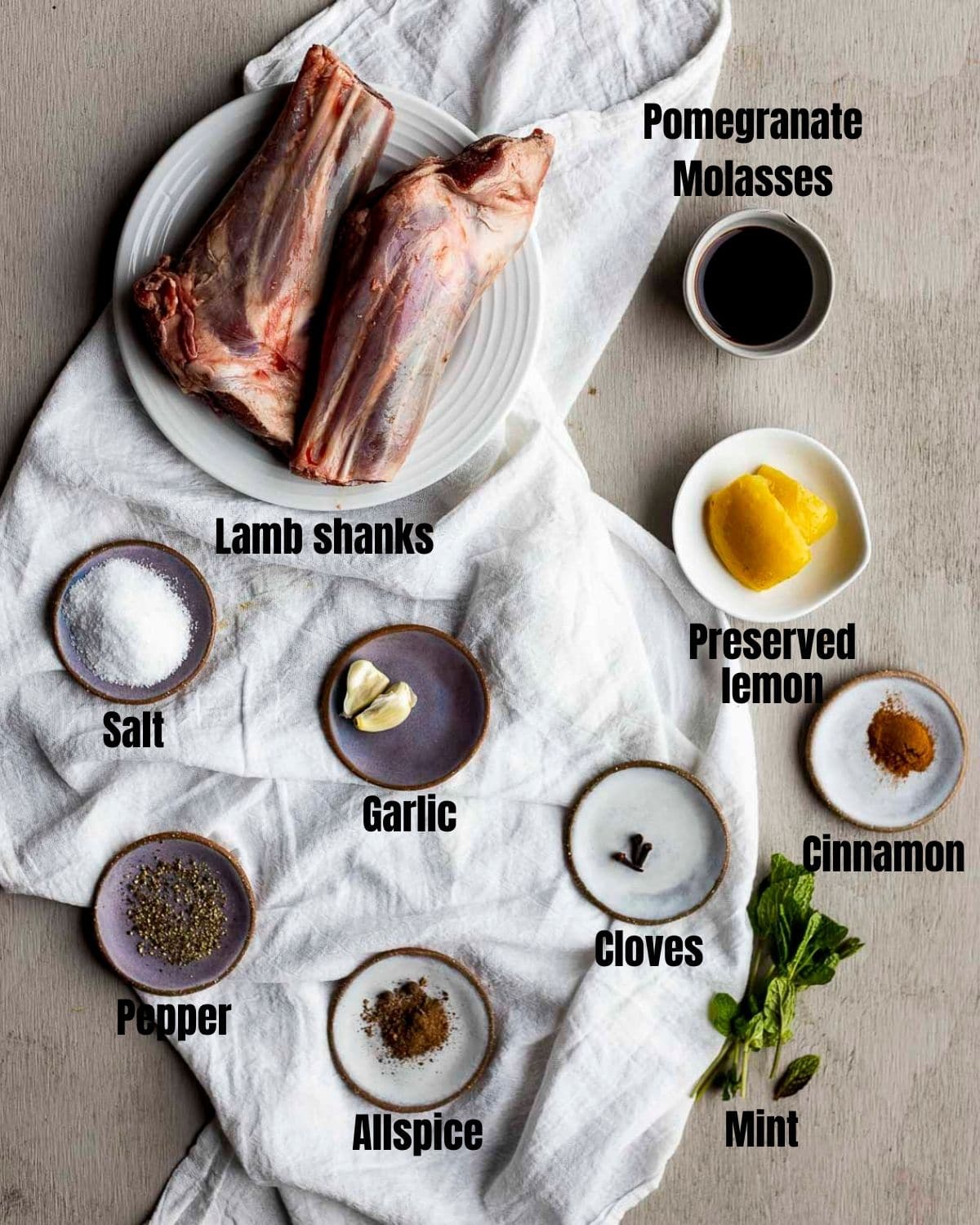 Ingredients to make sous vide lamb shanks arranged individually and labelled.