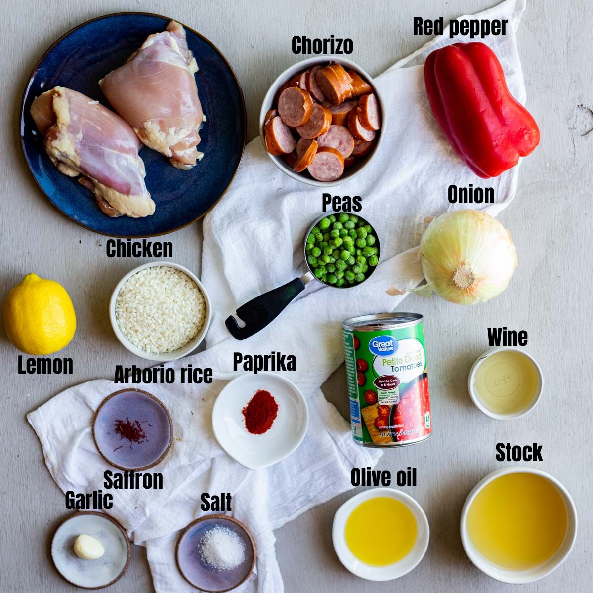 Ingredients to make Instant Pot paella arranged individually and labelled.