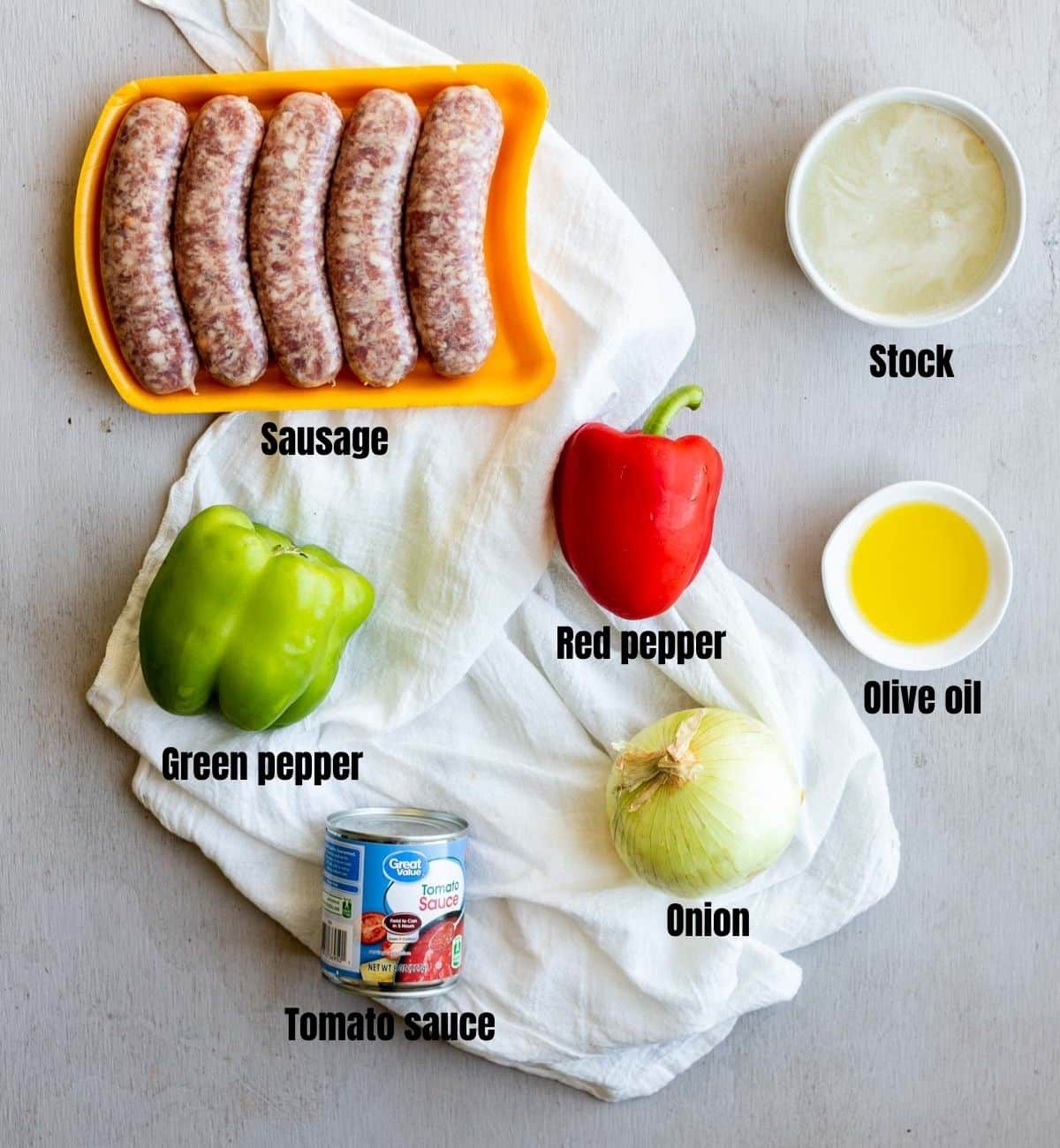 Overhead ingredients to make Instant Pot sausage arranged individually and labelled.
