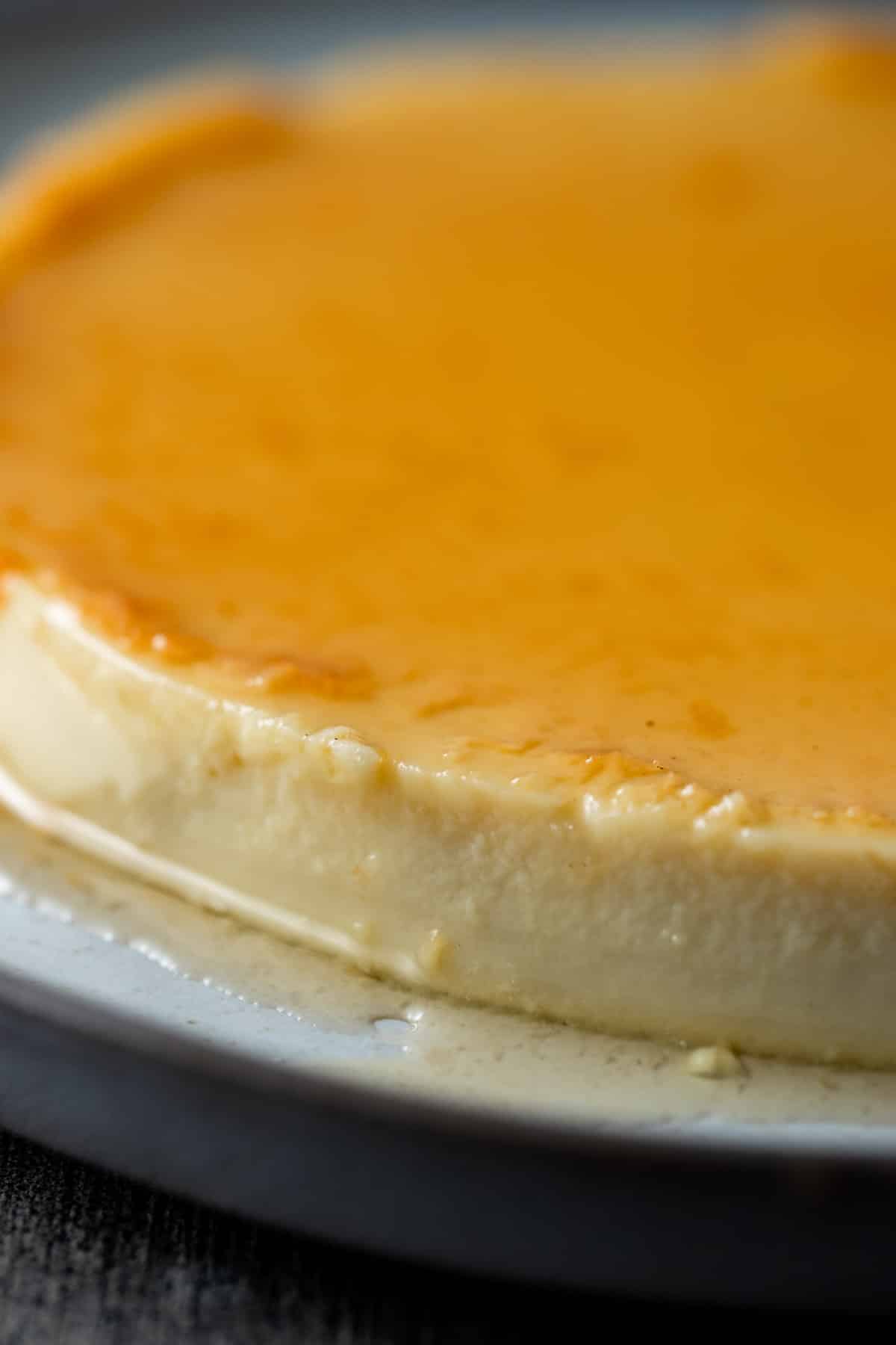 Close up view of Instant Pot flan on a plate.