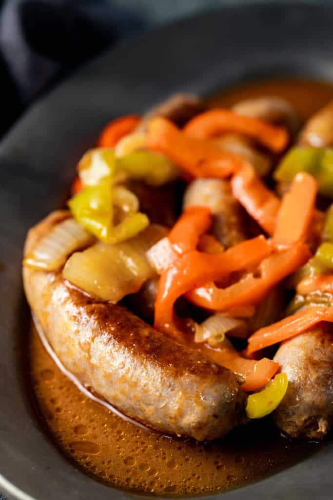 Close up view of Instant Pot sausage with peppers and onions.
