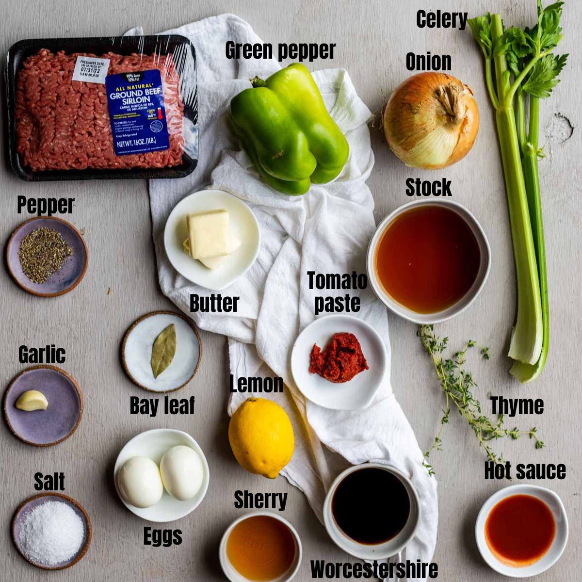 Ingredients to make mock turtle soup arranged individually and labelled.