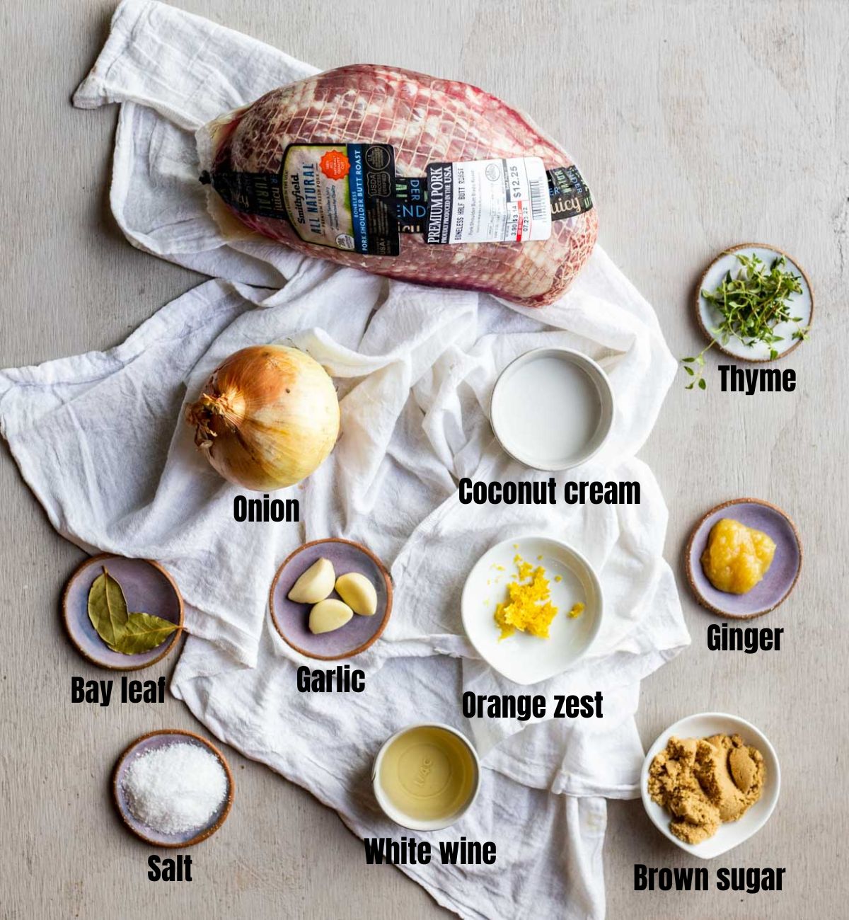 Ingredients to make sous vide pork shoulder arranged individually and labelled.