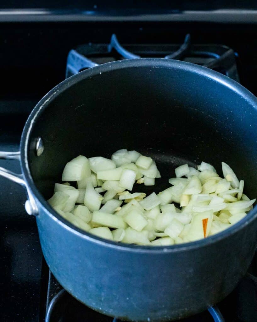 chopped onions cooking in a pot