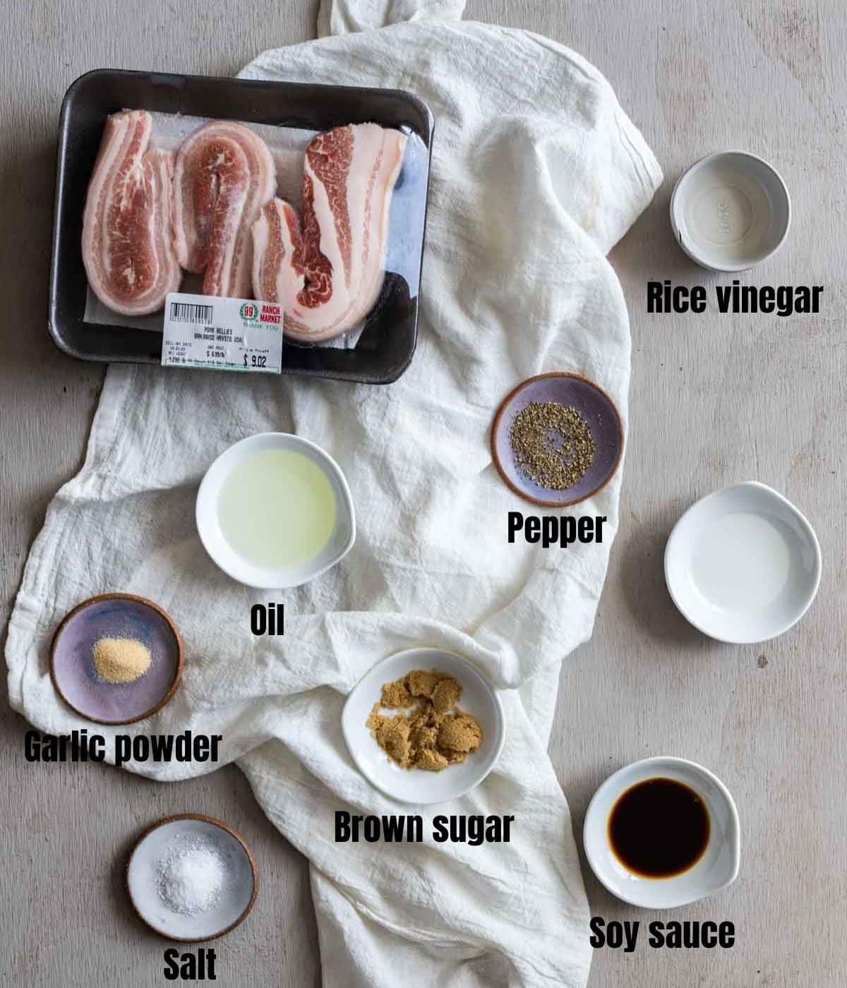 a bunch of ingredients for air fryer pork belly laid out