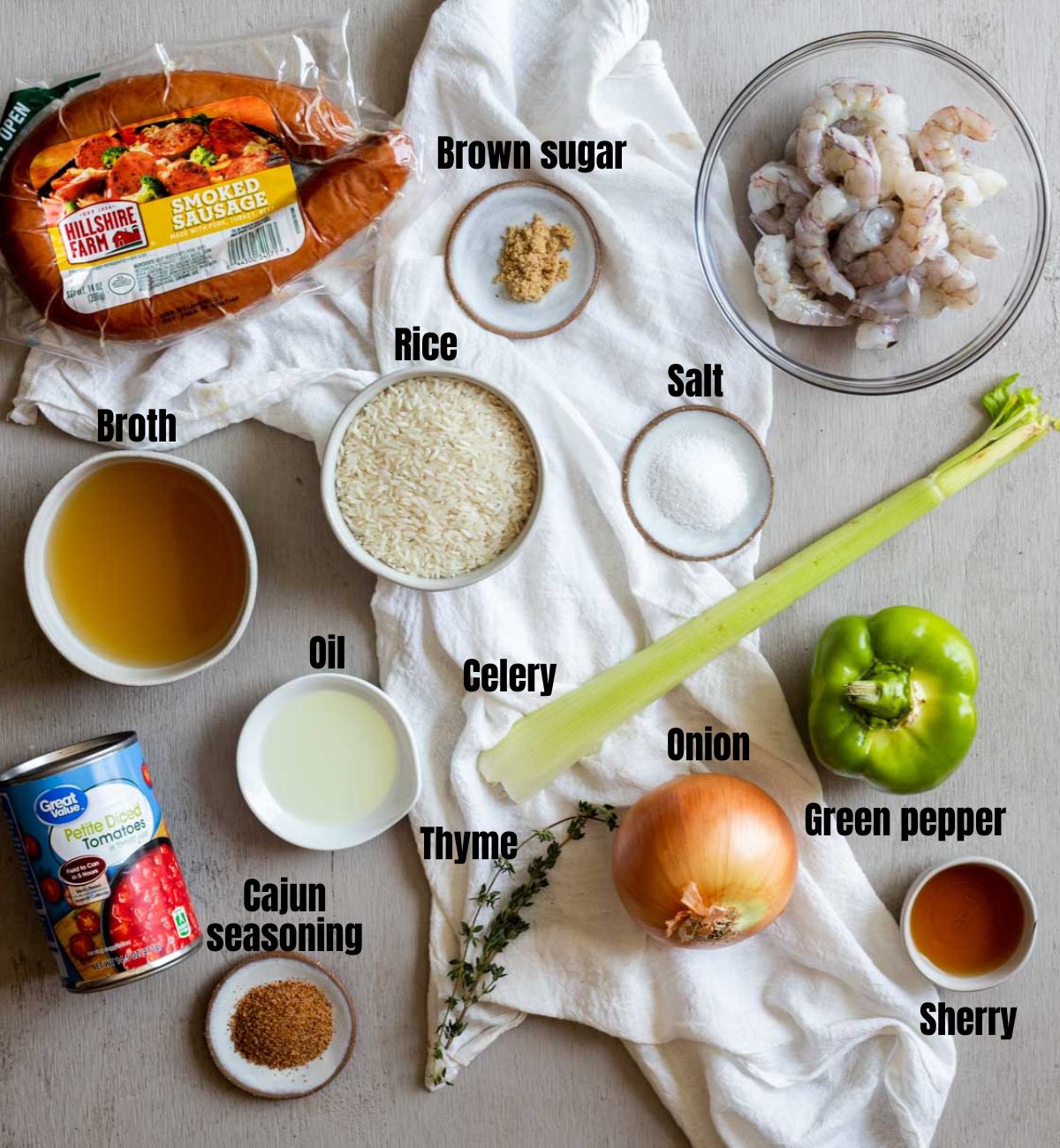 Ingredients to make Instant Pot jambalaya arranged individually and labelled.