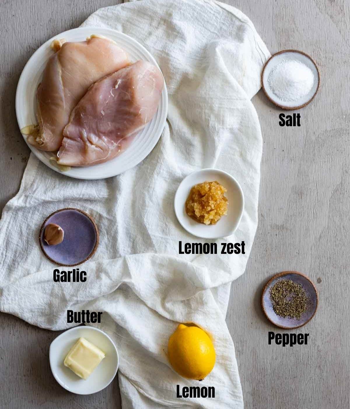 Ingredients to make sous vide frozen chicken breast arranged individually and labeled.