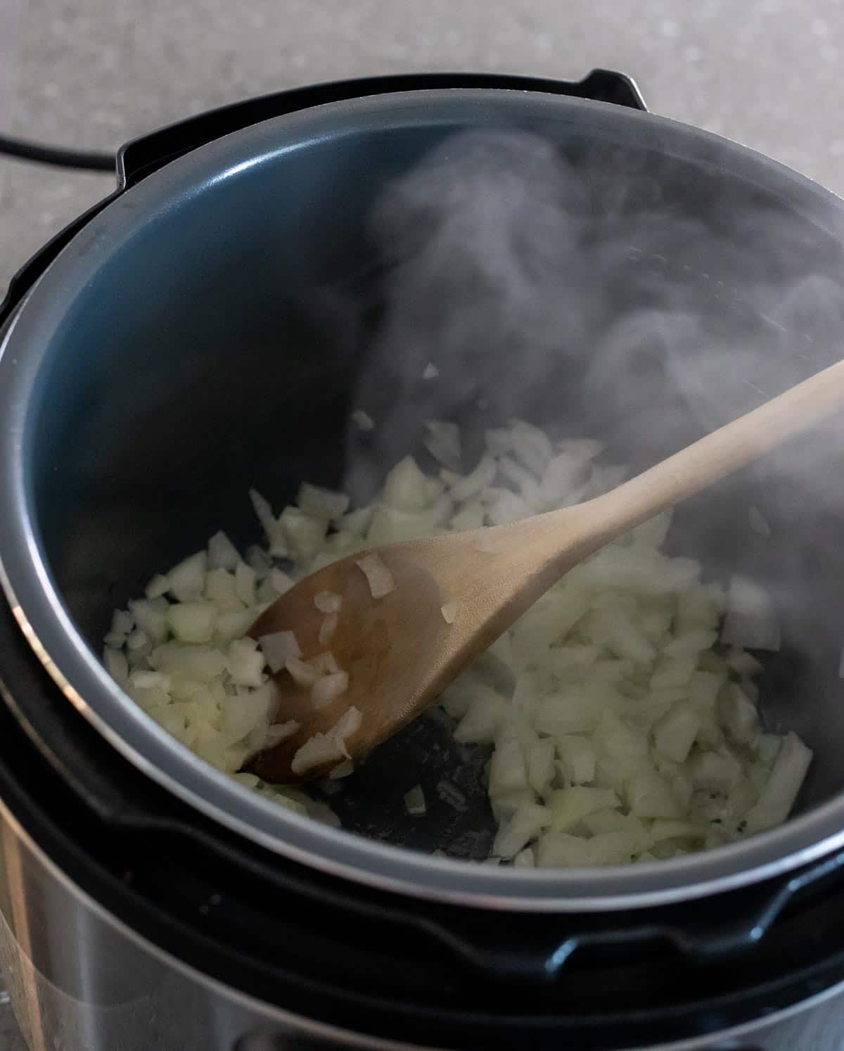 Onions sautéing in the Instant Pot.