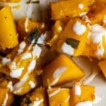 Close up few of cooked pumpkin cubes.