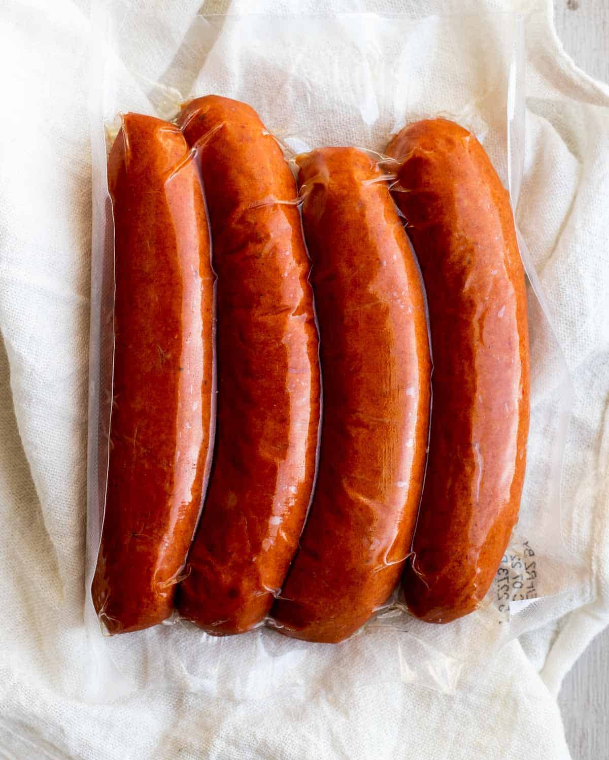 sausage links on a piece of plastic