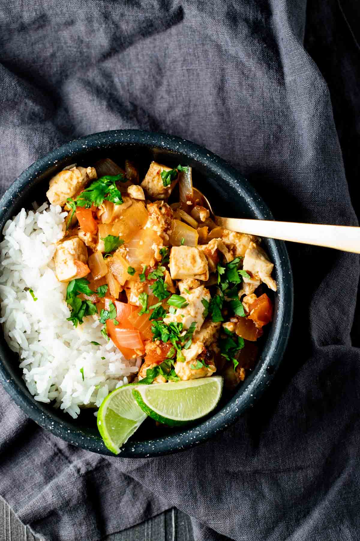 view of rice, tofu, and vegetables in a bowl ready to serve