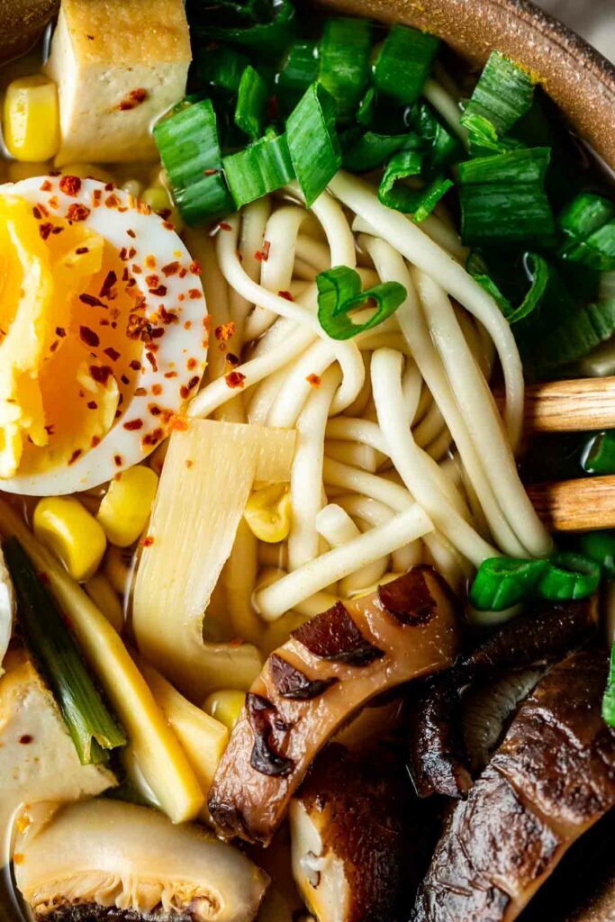 up close view of ramen with eggs, vegetables, and meat
