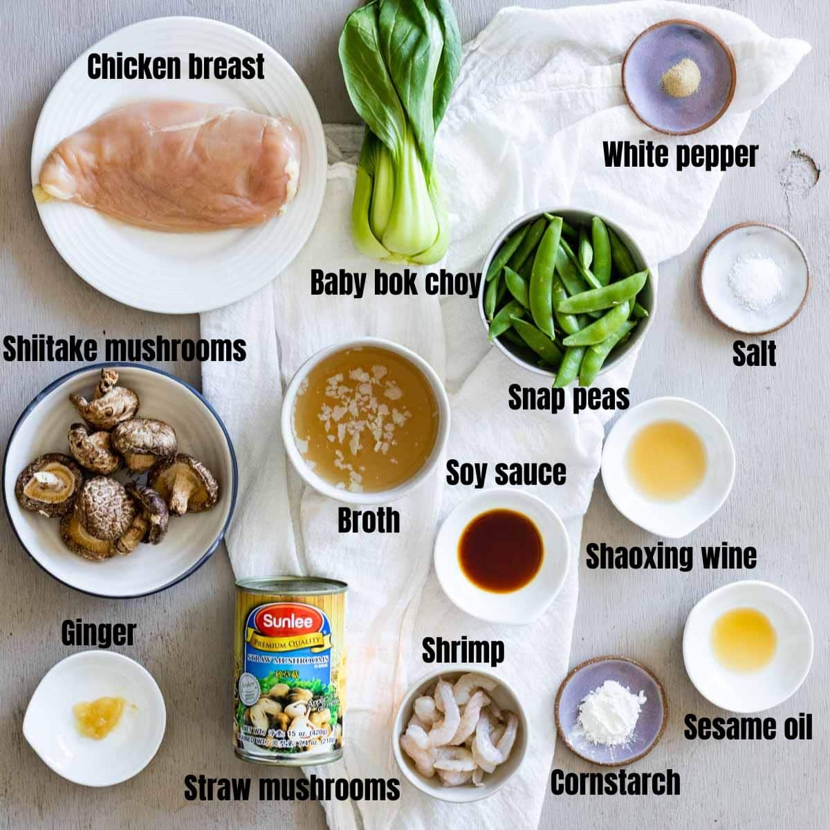 ingredients fro sizzling rice soup on a grey board