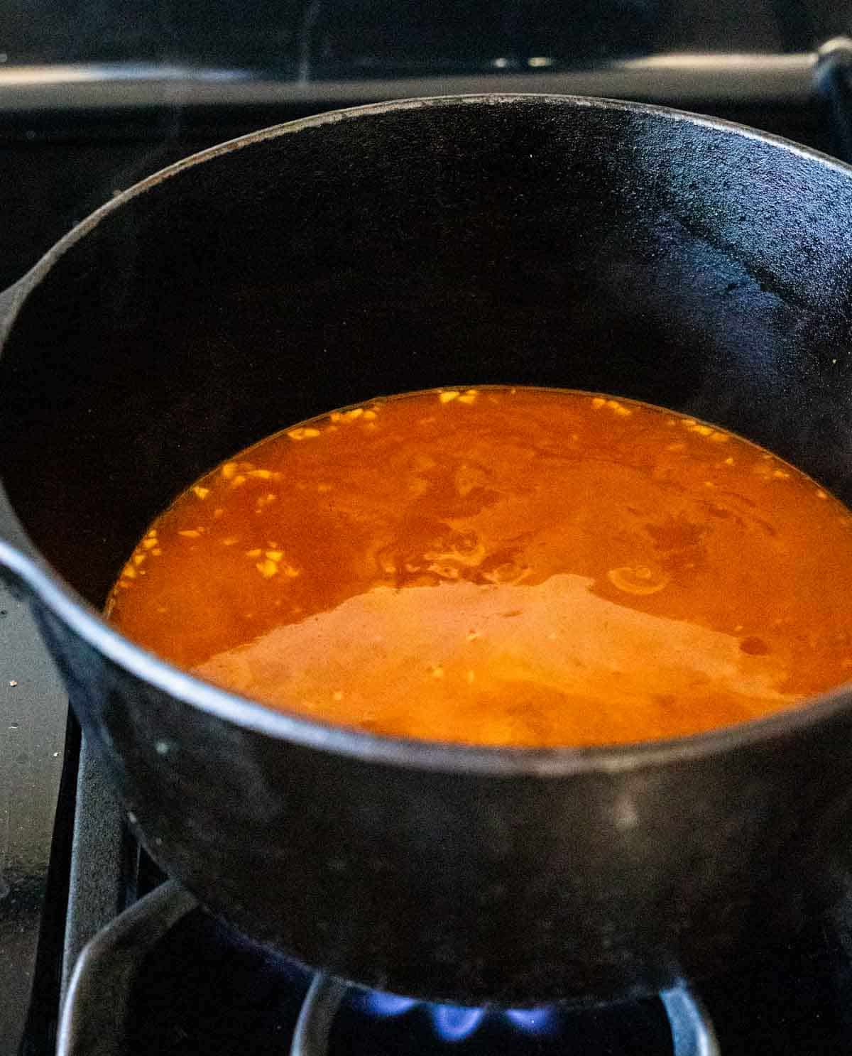 a pot of orange liquid