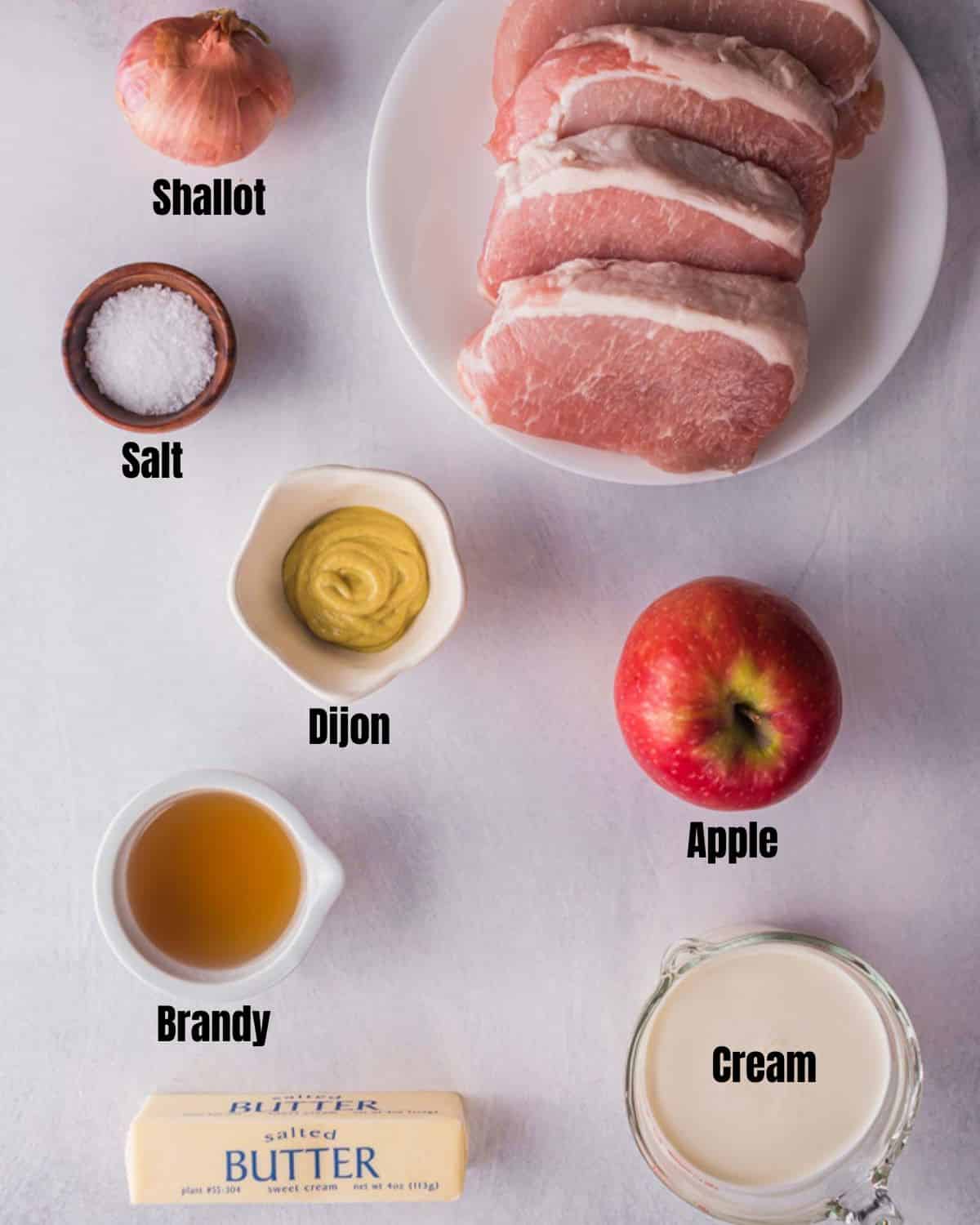 ingredients for sous vide pork chops on a board