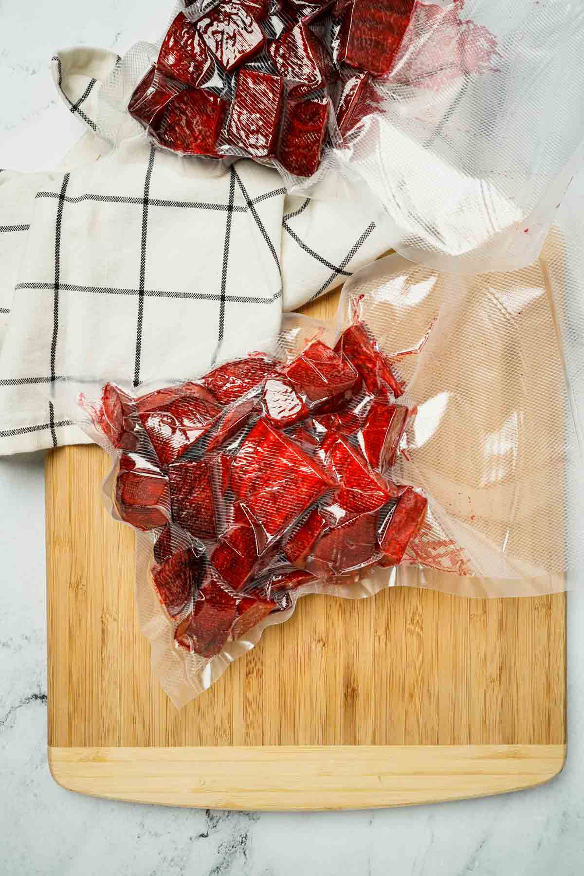 a vacuum seal bag of cut up red beets