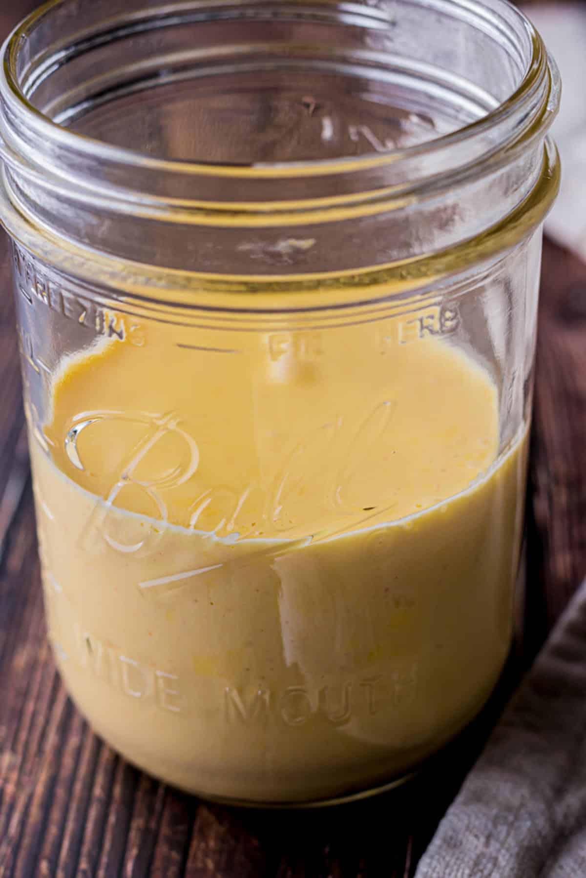 hollandaise sauce in a glass jar