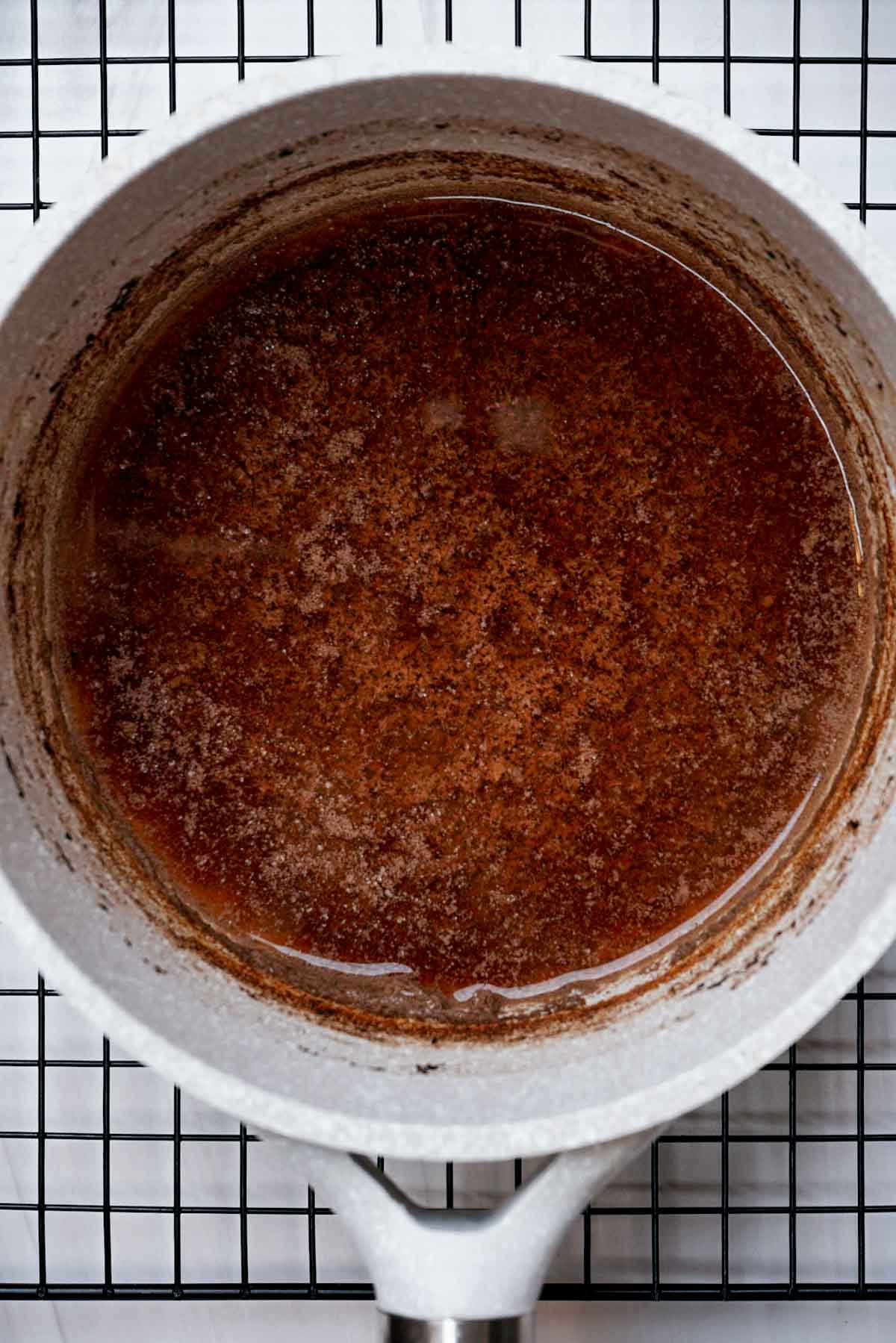 a dish of brown liquid
