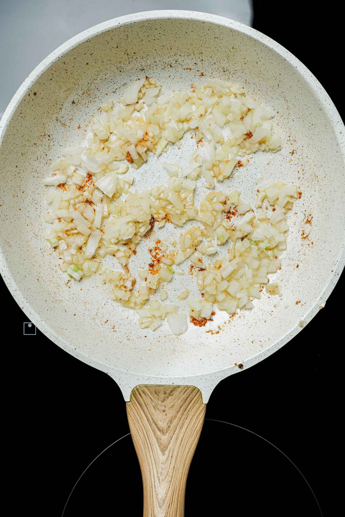 onions cooking in a skillet