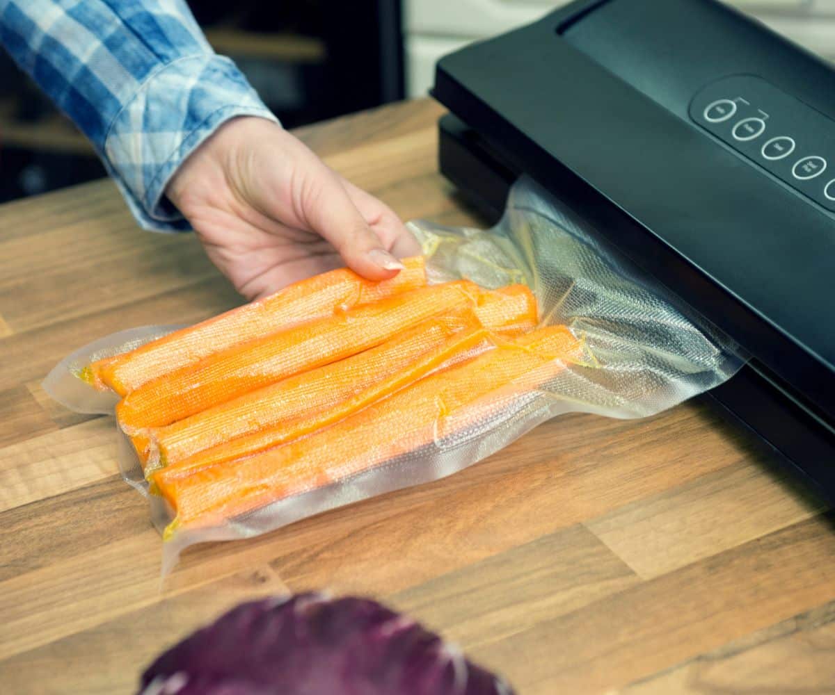 a vacuum sealed bag of carrots in a vacuum sealer