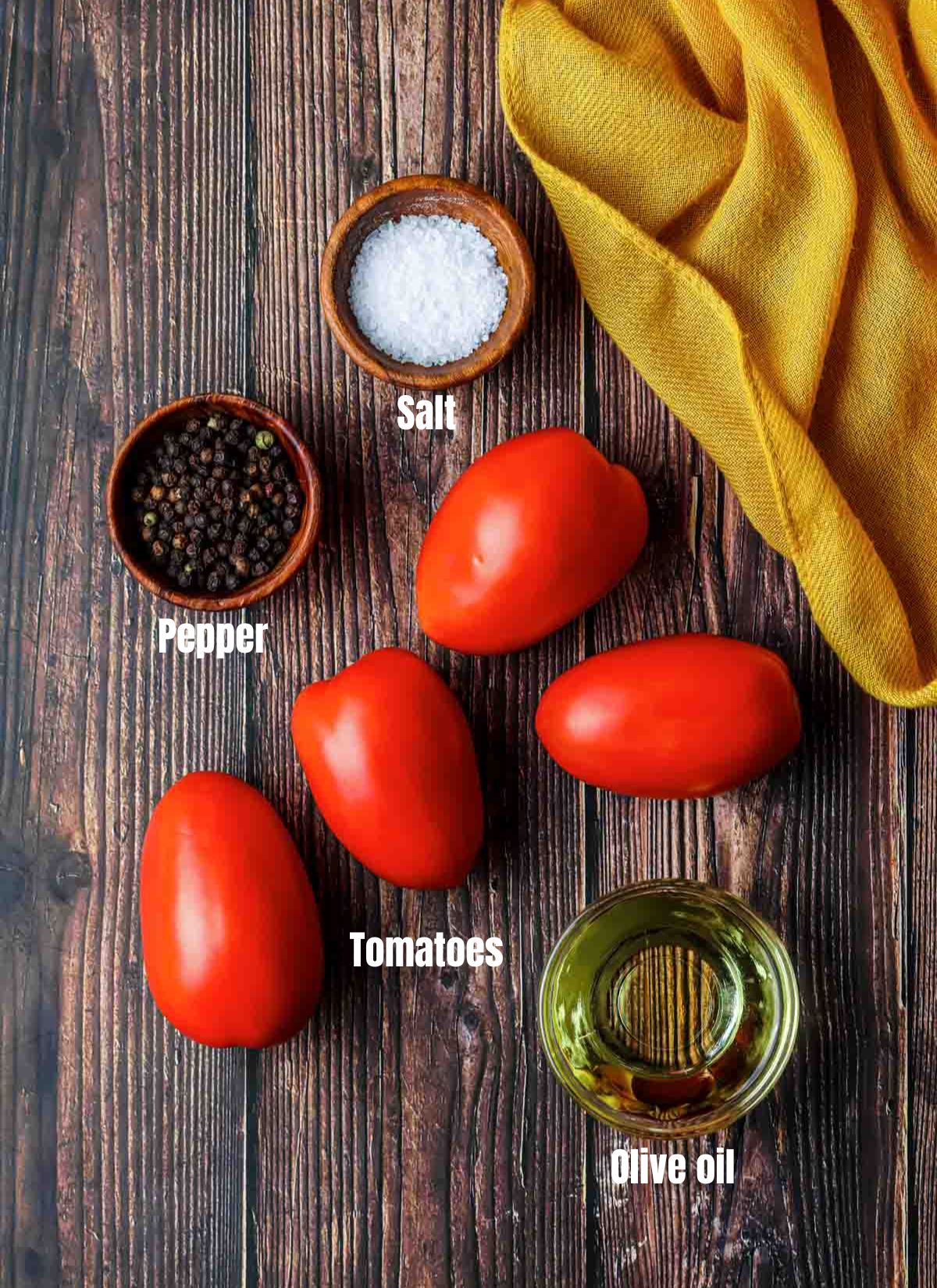 ingredients for fire roasted tomatoes on a wood board