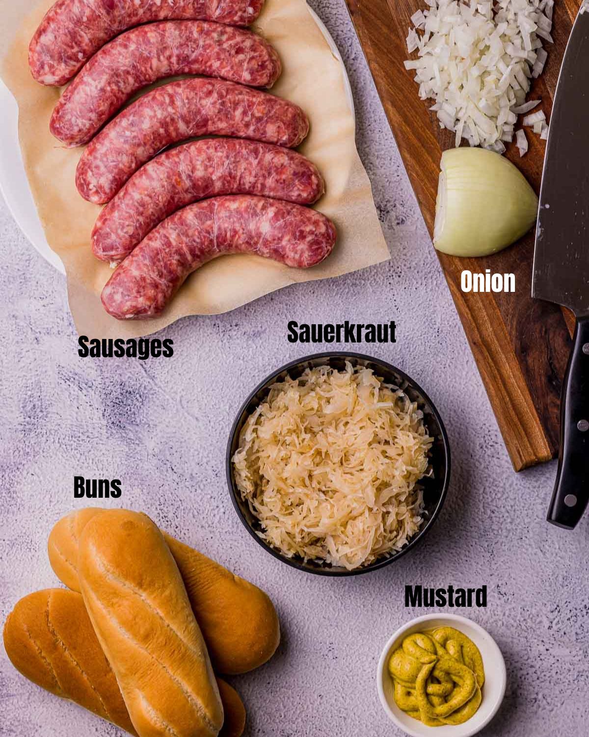 ingredients for sous vide sausage on a light colored board