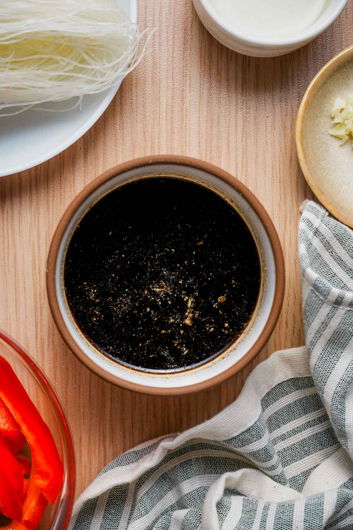 a bowl of dark sauce