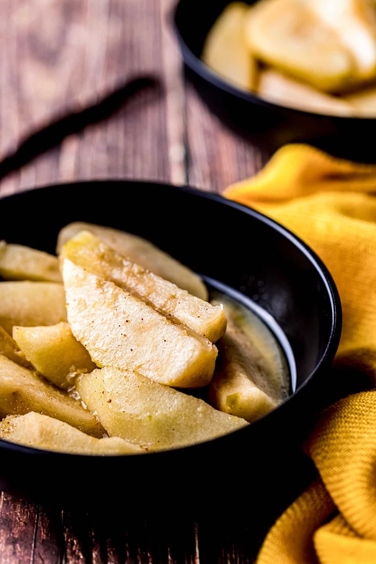 cooked sliced apples in a dish