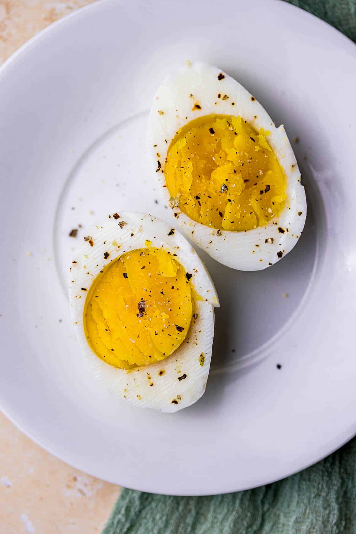 seasoned hard boiled eggs on a plate