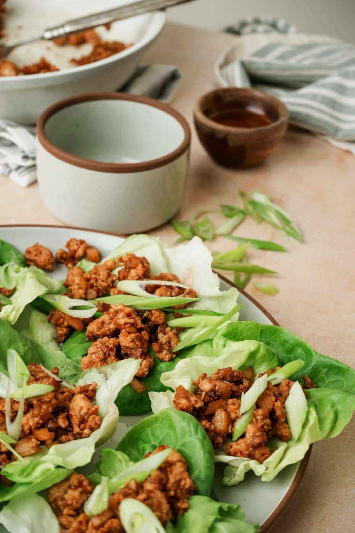 ground chicken in lettuce cups on a plate