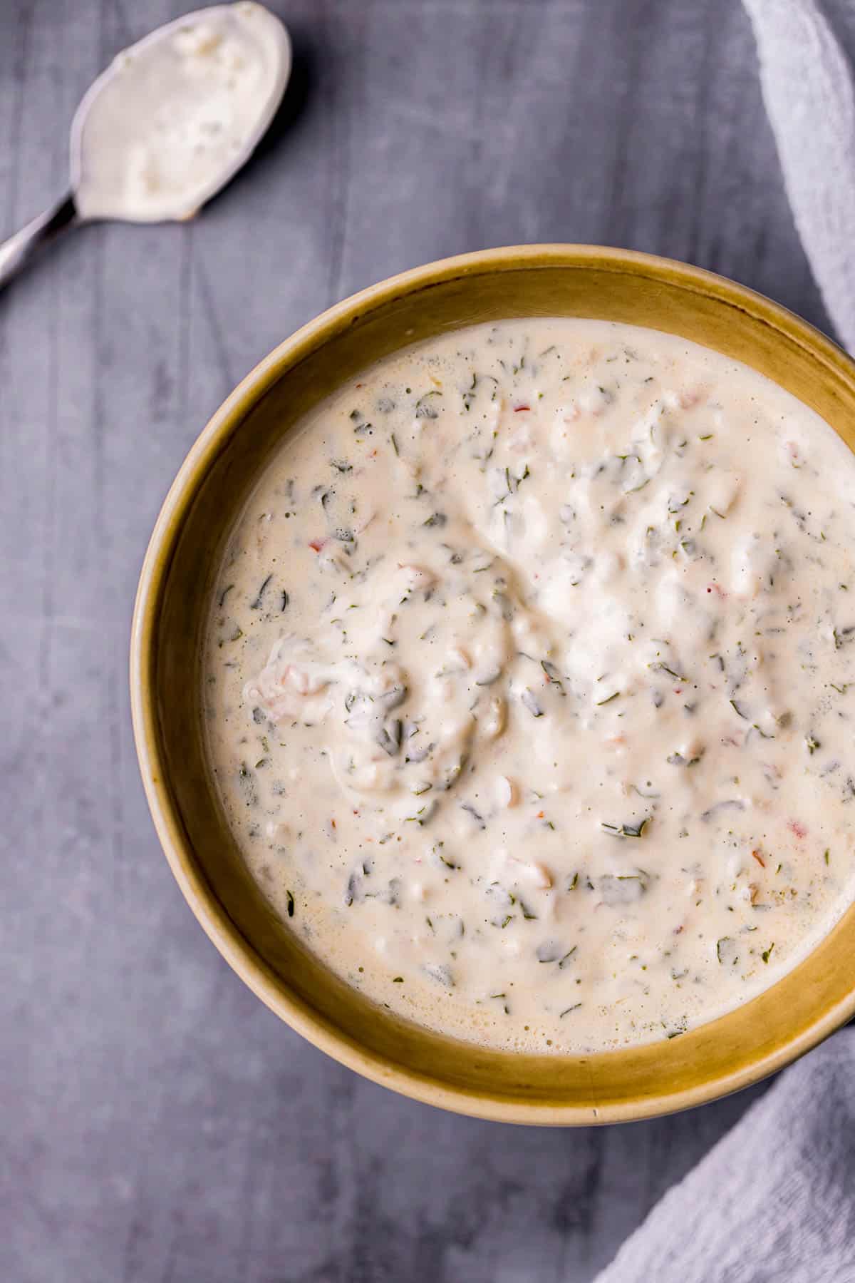 creamy herb sauce in a bowl