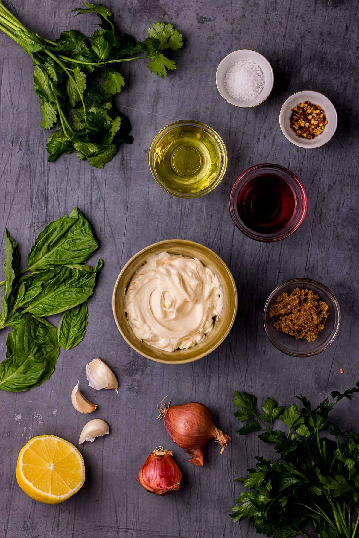 ingredients for chimichurri mayo on a board