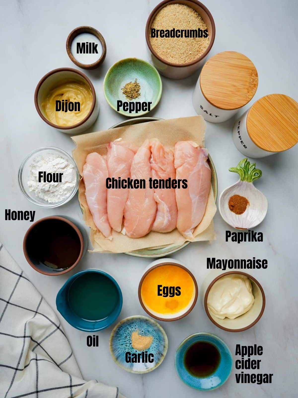 ingredients for sous vide chicken tenders on a white table