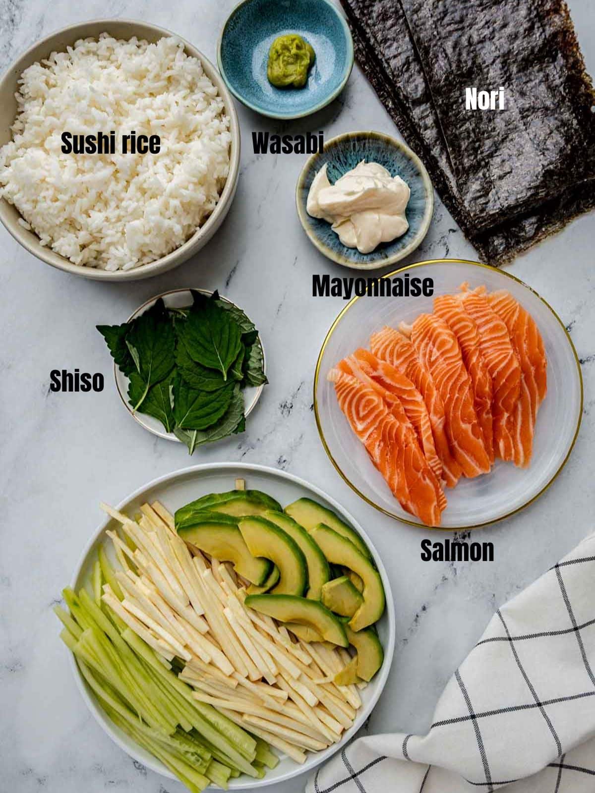 ingredients for temaki sushi on a white table.