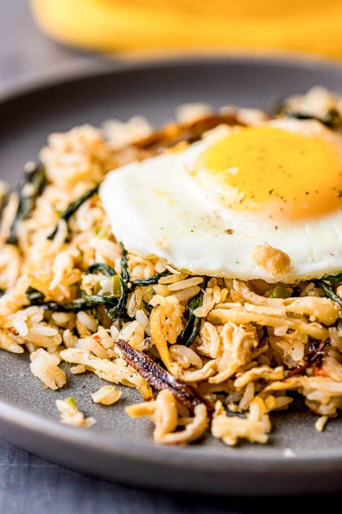 fried rice with an egg on tp