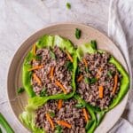 ground beef in lettuce cups with sliced carrots