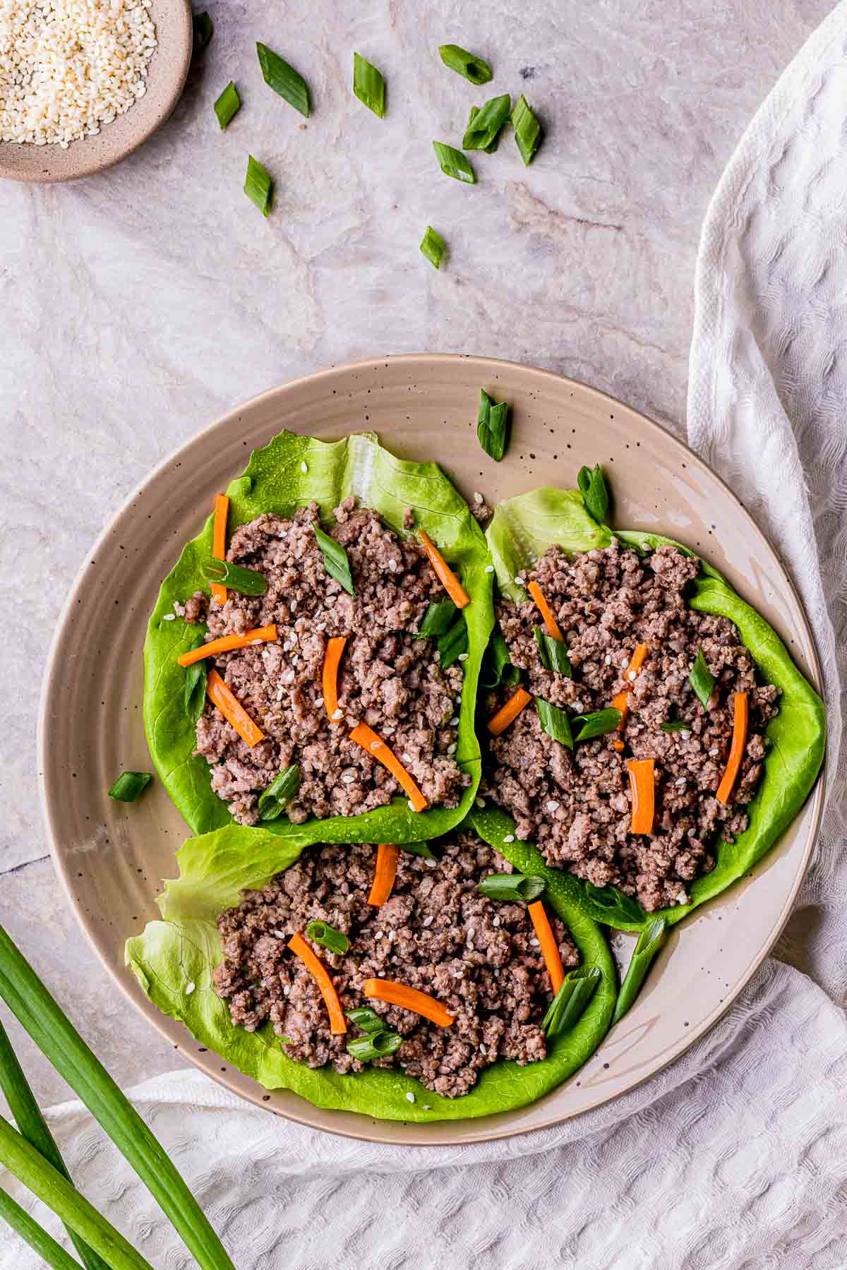 ground beef in lettuce cups with sliced carrots