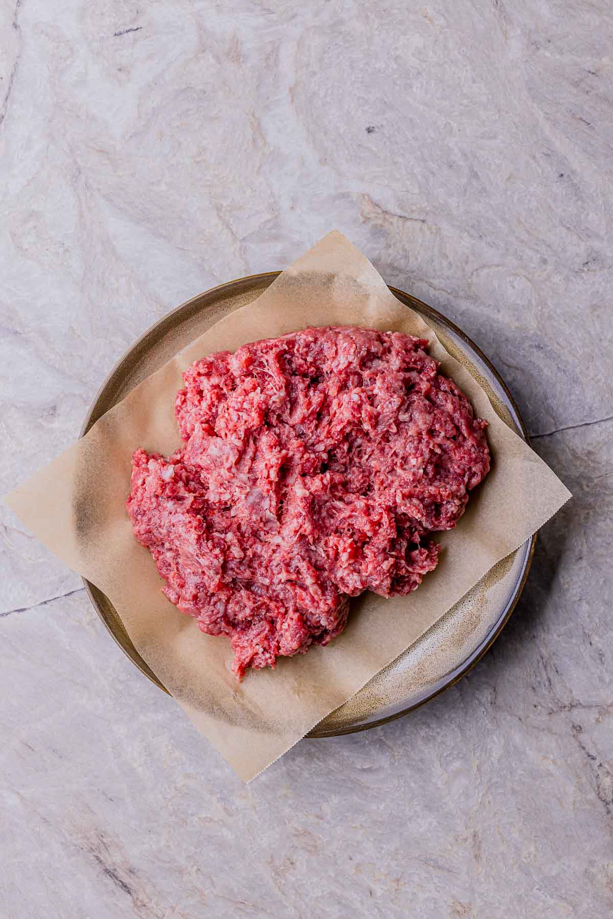 raw ground beef on a plate