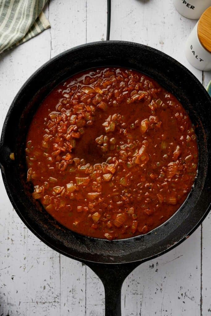 crushed tomatoes and seasonings in a skillet to make the paprika sauce