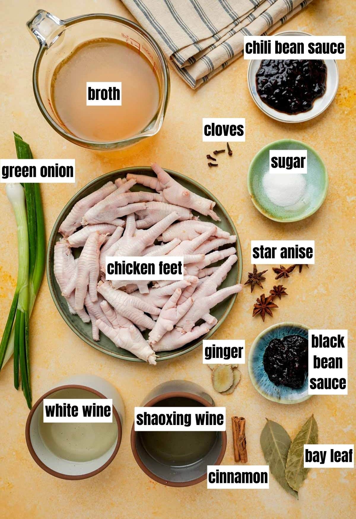 ingredients for chinese chicken feet on a yellow board with text overlay