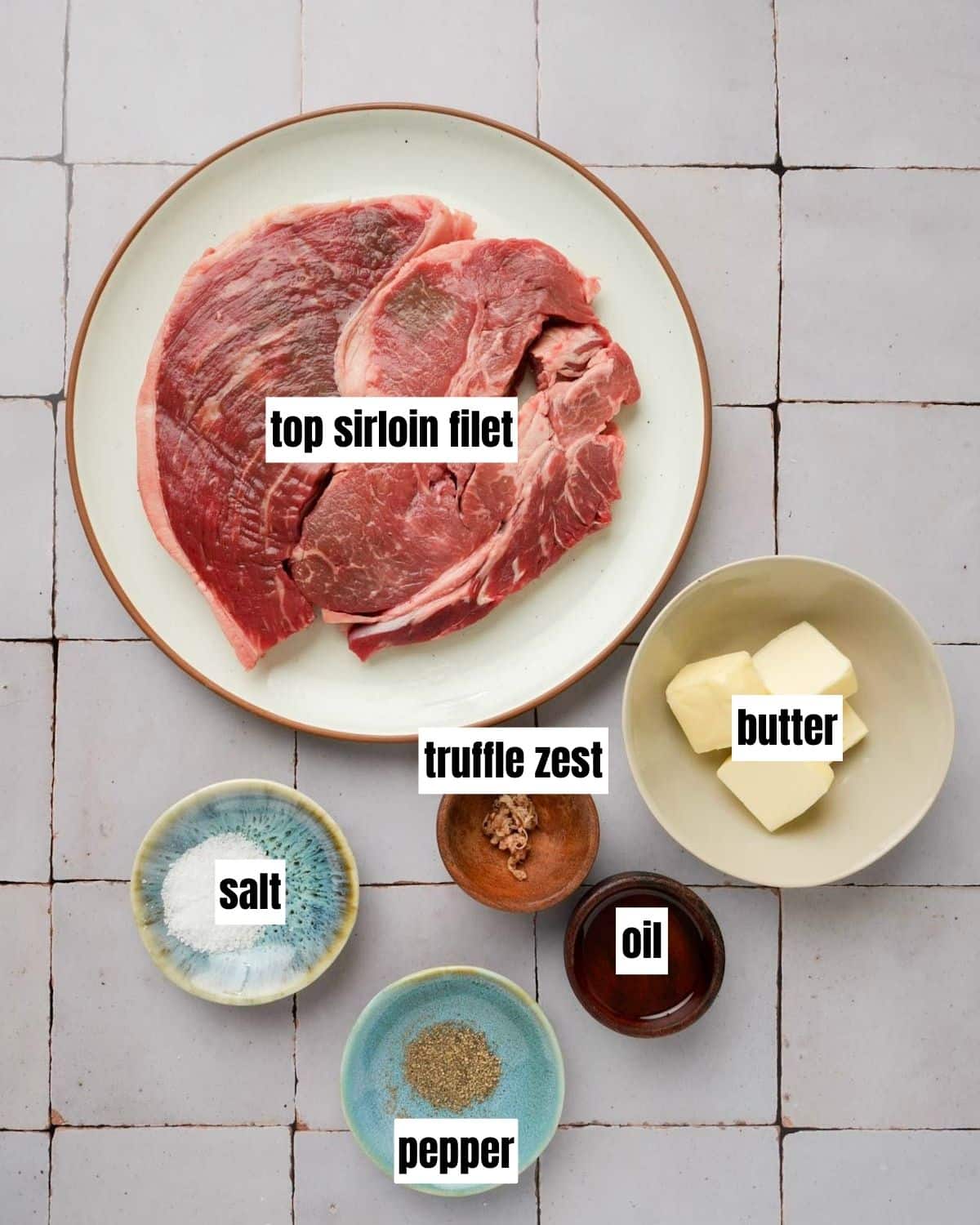 ingredients for sous vide top sirloin on a white surface