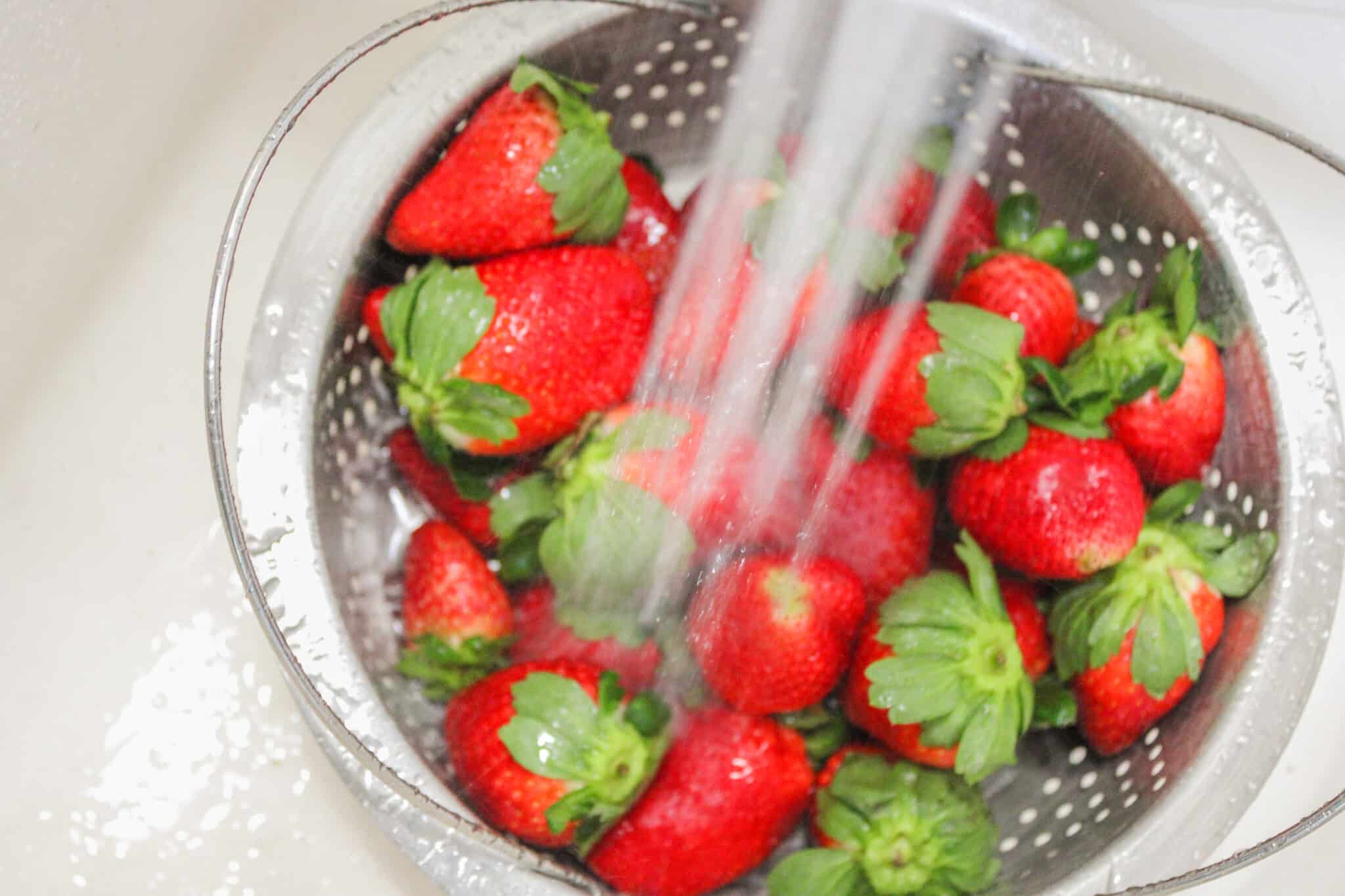 washing strawberries