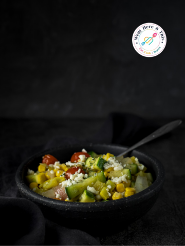 Healthy Calabacitas recipe featuring zucchini, corn, and tomatoes for a traditional Mexican side dish.