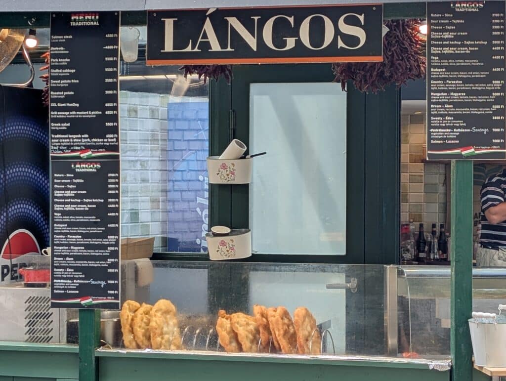 Lángos is a traditional Hungarian deep-fried flatbread