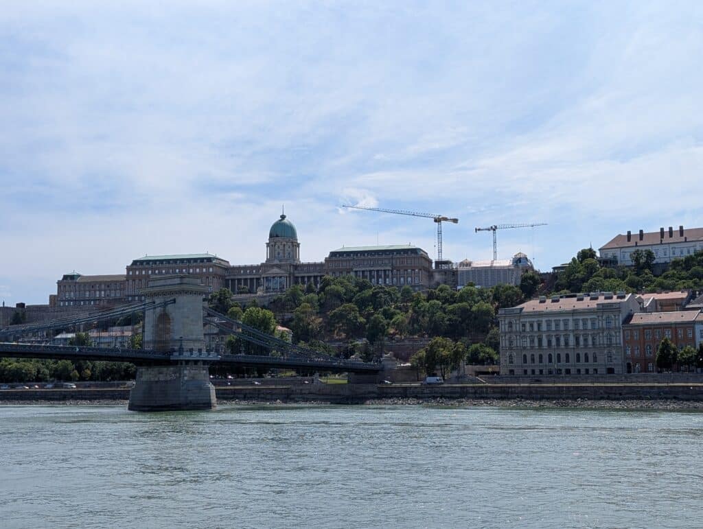 Historic Buda Castle with the Szechenyi Chain Bridge in the foreground connecting Buda to Pest