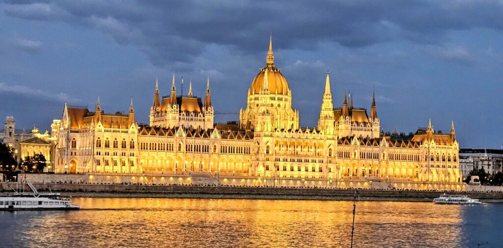 Hungarian Parliament Building in Budapest, beautifully illuminated at night.