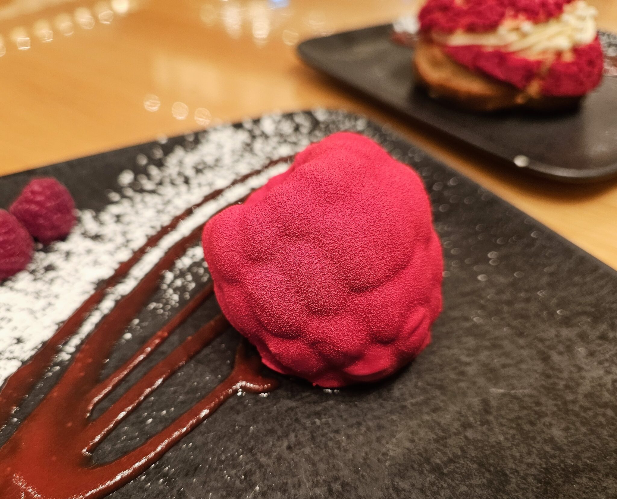 Raspberry shaped chocolate shell with Raspberry moose and jelly inside