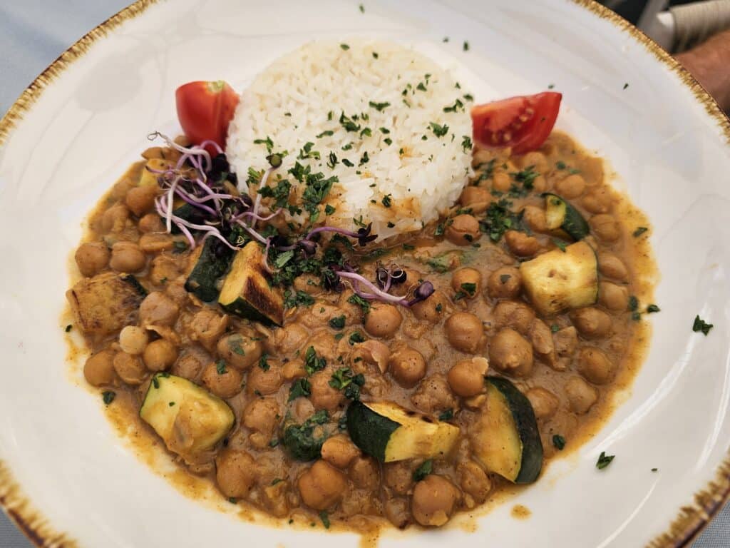 Chickpea and zucchini coconut curry with spinach and jasmine rice