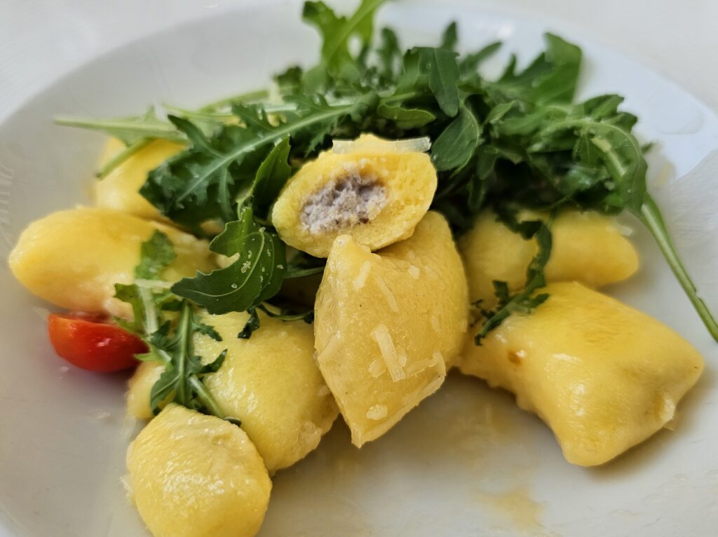Tender, golden gnocchi filled with a rich, earthy truffle paste adding incredible depth of flavor. The soft gnocchi paired beautifully with peppery fresh arugula and juicy tomatoes.
