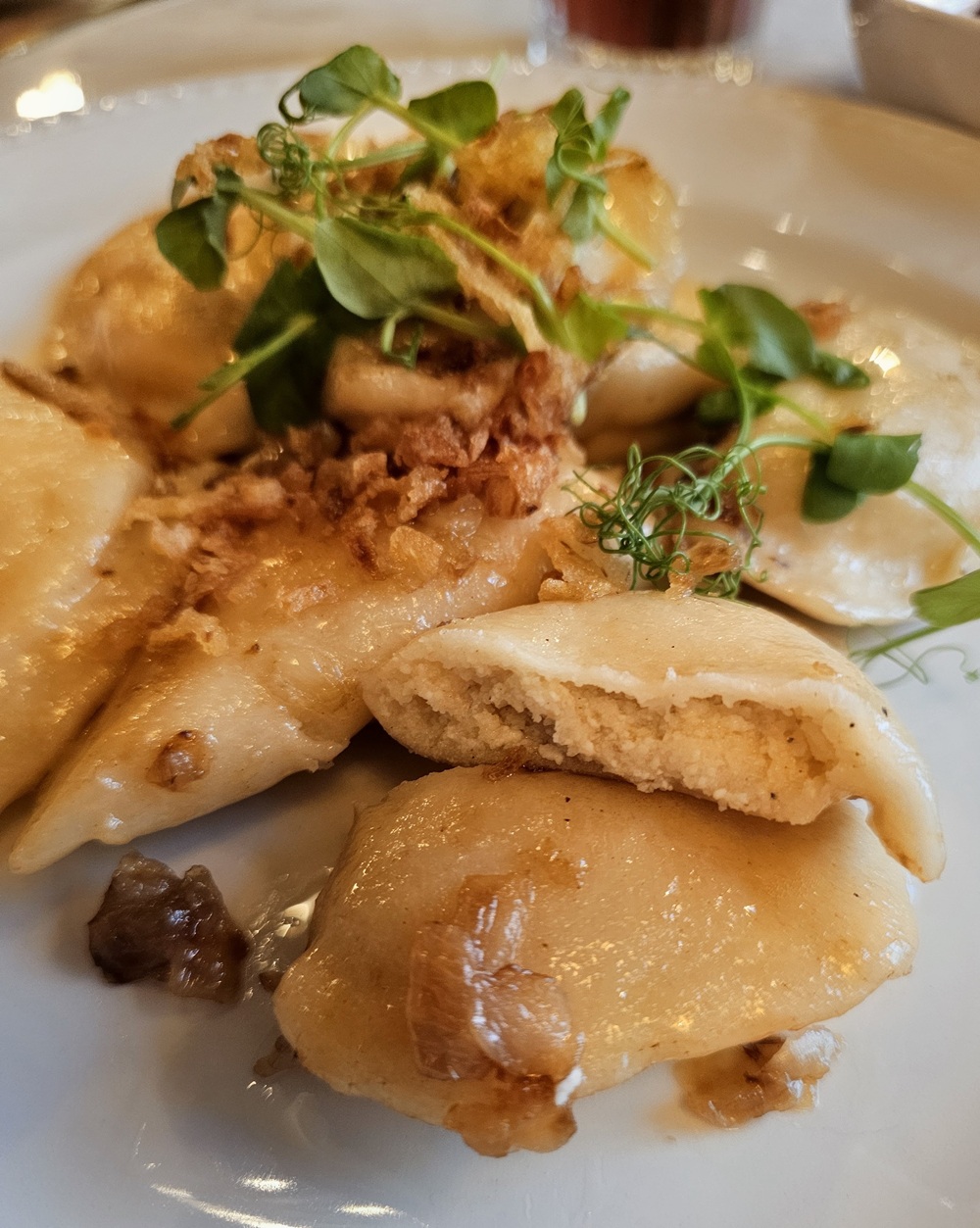 These classic Polish pierogi were filled with a comforting combination of creamy cottage cheese, potatoes and sautéed onion. The soft, tender dough wrapped around the savory filling made every bite rich and satisfying, while the onion added a little sweetness and depth. It's easy to see why this simple combination has become one of Poland's most beloved pierogi fillings. For us, it was a must-try while exploring Krakow—and definitely one of those dishes that makes you want to order just one more!